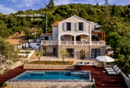 The classic Mediterranean villa with a swimming pool, surrounded by Mediterranean pine trees.