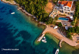 Aerial photography of the Mediterranean villa with direct sea frontage.