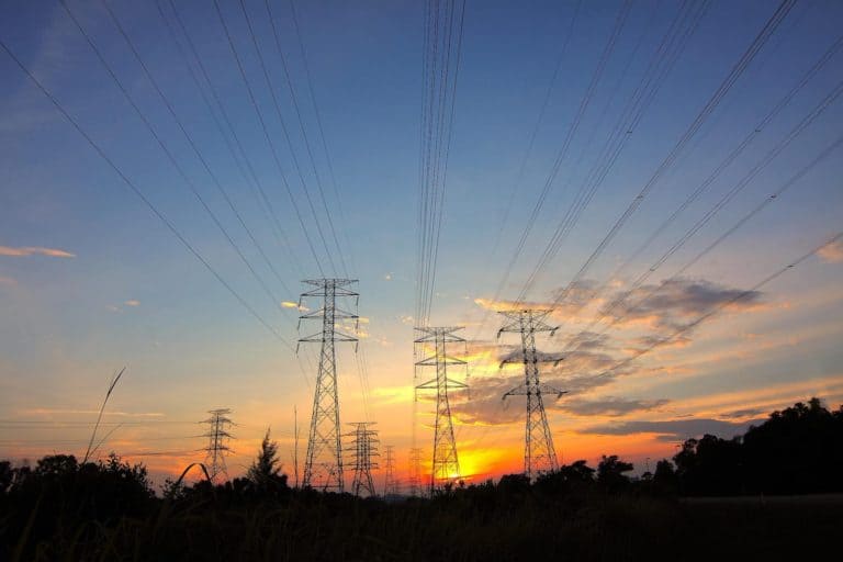 Three power lines during the golden hour.