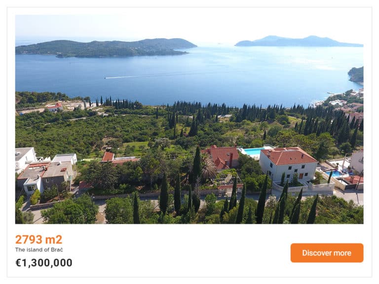 The ad for a luxury villa with a view on the blue sea and two islands in the distance.