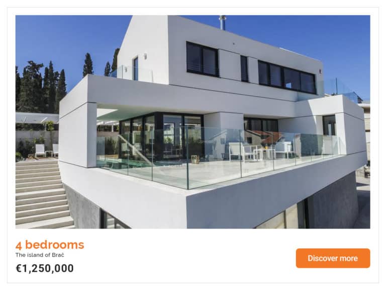 The ad for the luxury contemporary house spread over three floors and with unusual design.